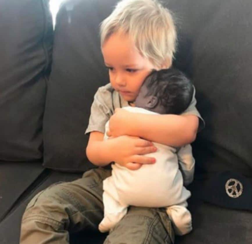 The stillborn baby was placed in his older brother’s arms, seconds later, a cry echoes loudly!