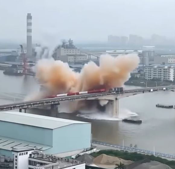 Tanker Caught Under a Crumbling Bridge