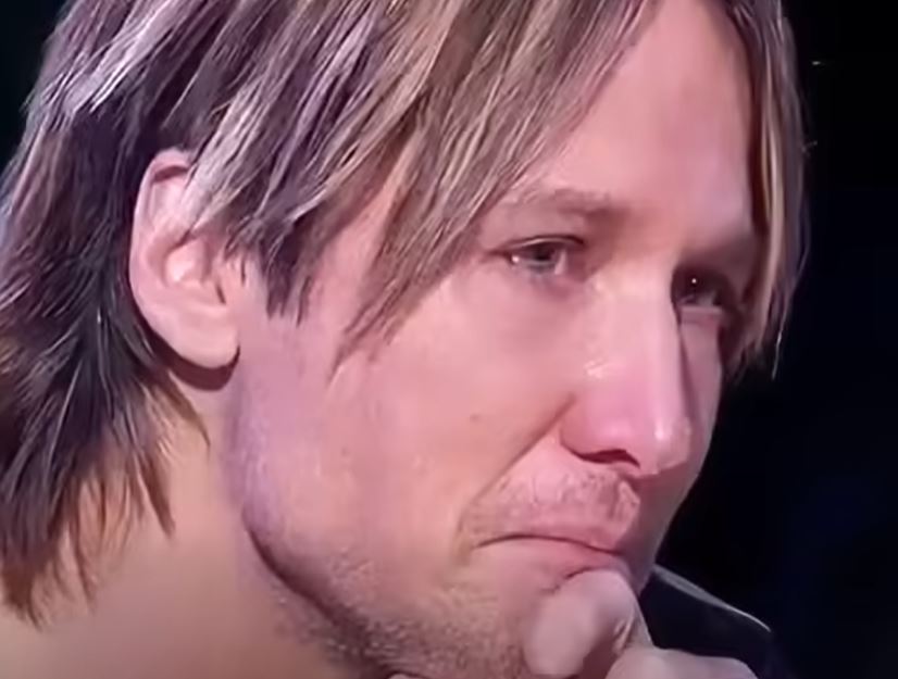 FANS RALLY AROUND KEITH URBAN AFTER HE ASKS THEM TO PRAY FOR HIM.